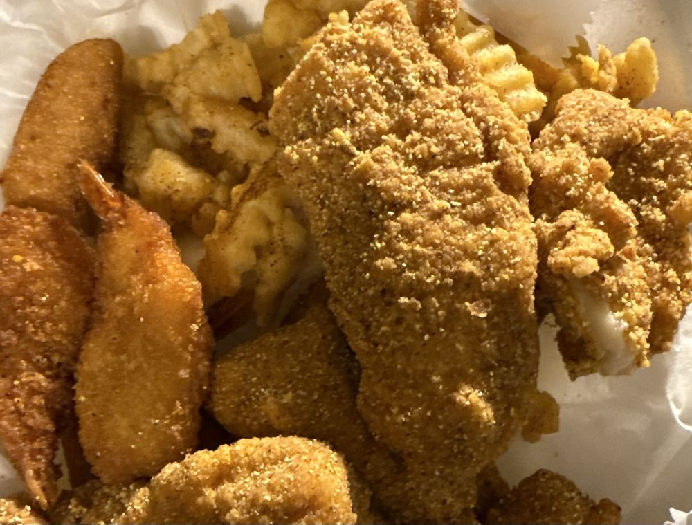 Millie’s Fish N Shrimp Logo