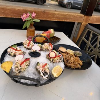 Tac/Quila - Half dozen aguachile oysters and deep fried calamari and margarita flight - Tapas/Small Plates Near Me - Palm Springs, California Tac/Quila - Half dozen aguachile oysters and deep fried calamari and margarita flight - Tapas/Small Plates Near Me - Palm Springs, California