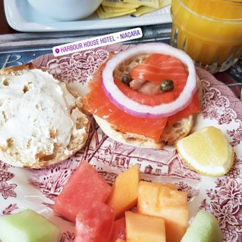 Harbour House - English muffin with lox, cream cheese and capers. Also fresh fruit and orange juice - Hotels Near Me - Niagara-on-the-Lake, Ontario