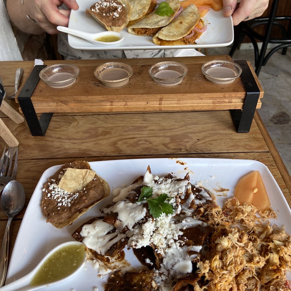 My husband had the pork quesadilla and I had the mole chilaquiles. We also enjoyed a flight of the hot chocolates. My husband had the pork quesadilla and I had the mole chilaquiles. We also enjoyed a flight of the hot chocolates.