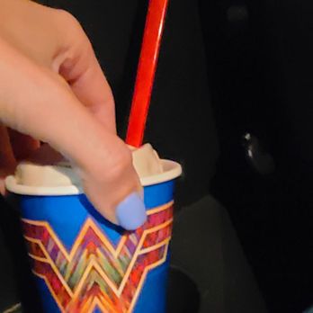 DQ / Orange Julius - a person putting a toothbrush in a cup - Ice Cream & Frozen Yogurt Near Me - Yucaipa, California