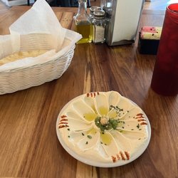 Green Olives Cafe & Pizzeria - Side of hummus.