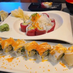 Lion King roll *not baked* (front), Kampachi Sashimi (top left), & Sakura Roll