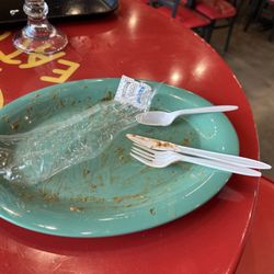 Fuzzy's Taco Shop - Note the unused spoon that will reside in a landfill long after my grandchildren have left the Earth. It's like a bad airplane meal.