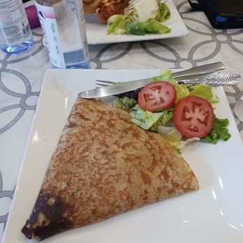 Delices De Maurice - Crepe plated with salad. Looks burned but was NOT. Plenty of filling. - Bakeries Near Me - Katy, Texas Delices De Maurice - Crepe plated with salad. Looks burned but was NOT. Plenty of filling. - Bakeries Near Me - Katy, Texas