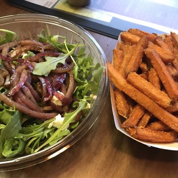 Milk Burger - arugula salad with a side of sweet potato fries - Burgers Near Me - Bronx, New York