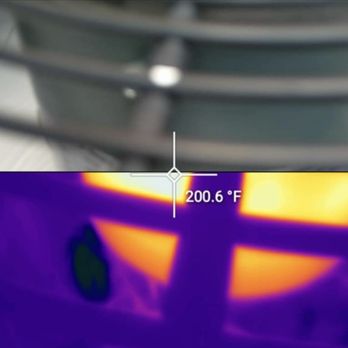 Allen HVAC Services - FLIR technology being used to show a client the temperature of their condenser fan motor. - Heating & Air Conditioning/HVAC Near Me - Rockwall, Texas