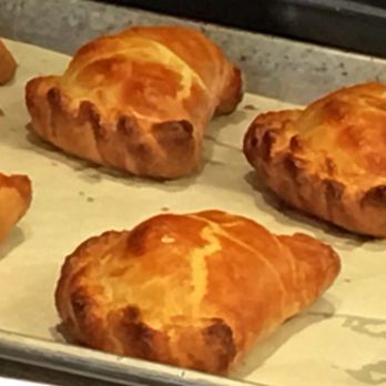 Savory Crust - Bacon and pork belly empanadas fresh off the baking sheet! - Empanadas Near Me - Morton Grove, Illinois Savory Crust - Bacon and pork belly empanadas fresh off the baking sheet! - Empanadas Near Me - Morton Grove, Illinois