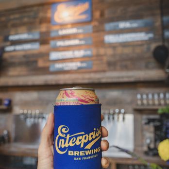Enterprise Brewing - a person holding a can of beer - Breweries Near Me - San Francisco, California