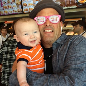 Dunkin' - Little munchin Brody with Uncle Dunkin' John.  Eat more munchkins. - Donuts Near Me - Laguna Hills, California