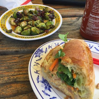 Double Dragon - Half a grilled chicken banh mi and brussels. Baguette is delicious! - Sandwiches Near Me - Portland, Oregon