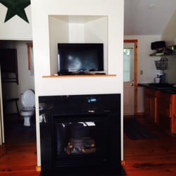 Yarmouth Country Cabins - this is the cozy fire place and flat screen tv in #10 !!
