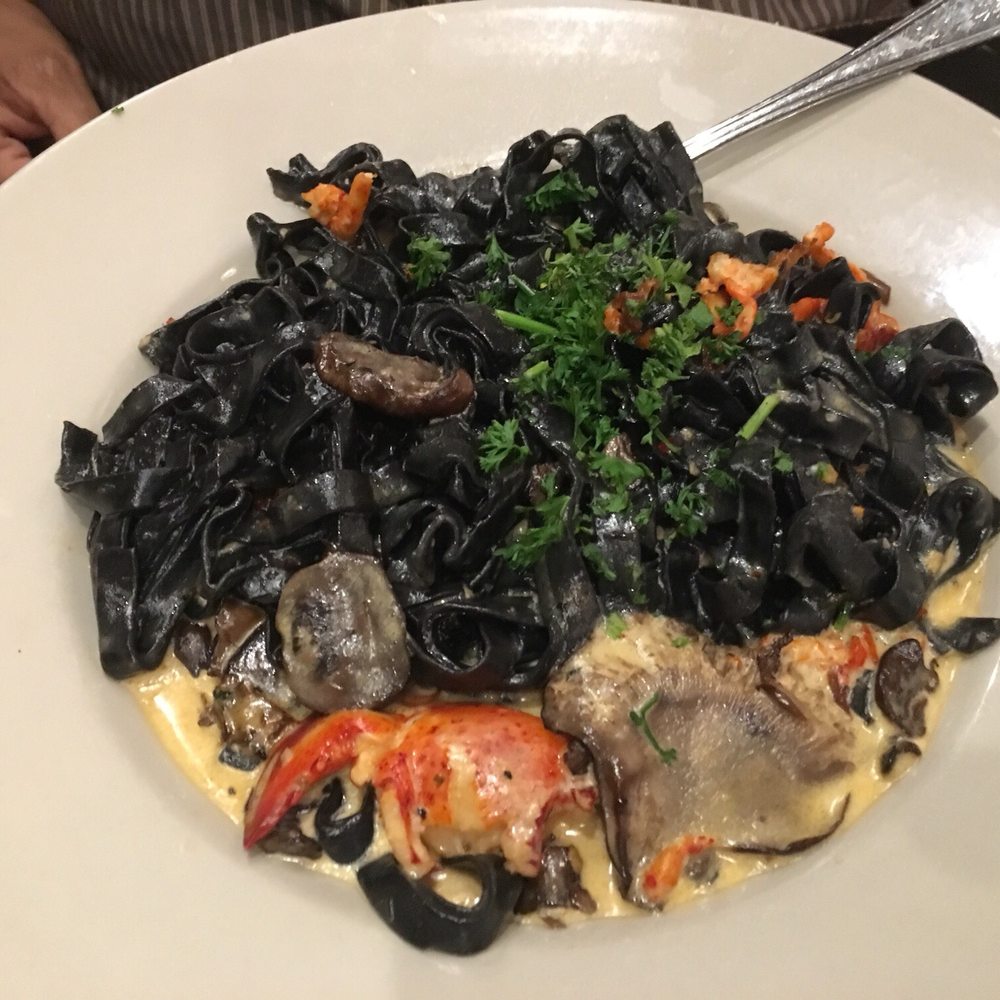 Monica's - Black Fettuccine with Lobster - Italian Near Me - Coralville, Iowa Monica's - Black Fettuccine with Lobster - Italian Near Me - Coralville, Iowa