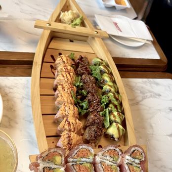 Moonga Asian Bistro - Very nice presentation of sushi when ordering four items. - Asian Fusion Near Me - Kaneohe, Hawaii Moonga Asian Bistro - Very nice presentation of sushi when ordering four items. - Asian Fusion Near Me - Kaneohe, Hawaii