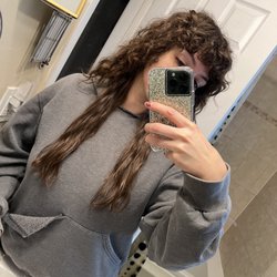 Gina Renee's Salon & Spa - Bottom is flat and top is wavy. Bangs are curly. Looks terrible
