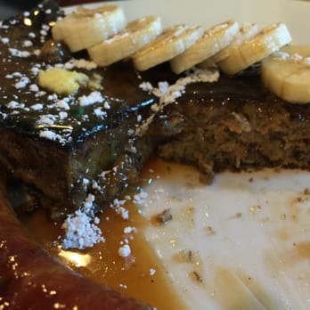 Vovomeena - Pain Perdu (delicious banana bread) with whiskey caramel sauce and fried pork sausage - Coffee & Tea Near Me - Phoenix, Arizona