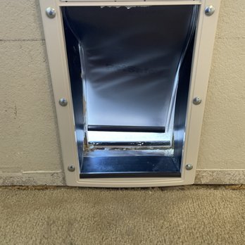 Sometimes Spouse - Dog door does not open or shut properly due to extra insulation and spray foam protruding into door. - General Contractors Near Me - Hewitt, Texas