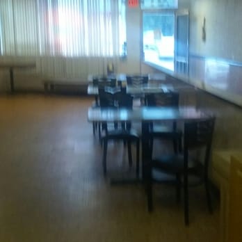 Peking - a blurry image of a dining room - Chinese Near Me - Geneva, Ohio Peking - a blurry image of a dining room - Chinese Near Me - Geneva, Ohio