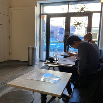 Think Coffee - Tables places alongside the wall! Kind of cozy, the seats have plugs underneath so you can work there for awhile! Calm place. - Coffee & Tea Near Me - Brooklyn, New York