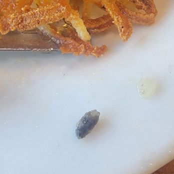 Denny's - Hash browns with unidentified something on plate - Diners Near Me - Oroville, California Denny's - Hash browns with unidentified something on plate - Diners Near Me - Oroville, California