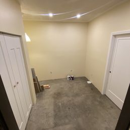 The completed 10x11 room Oliver and his crew built in my garage. Complete with closet. And door to the garage.