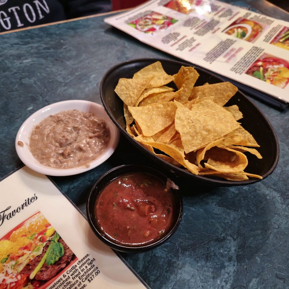 La Costa Restaurant - As soon as you take a seat, salsa and baked beans are served on warm Totia chips. - Mexican Near Me - Burien, Washington La Costa Restaurant - As soon as you take a seat, salsa and baked beans are served on warm Totia chips. - Mexican Near Me - Burien, Washington