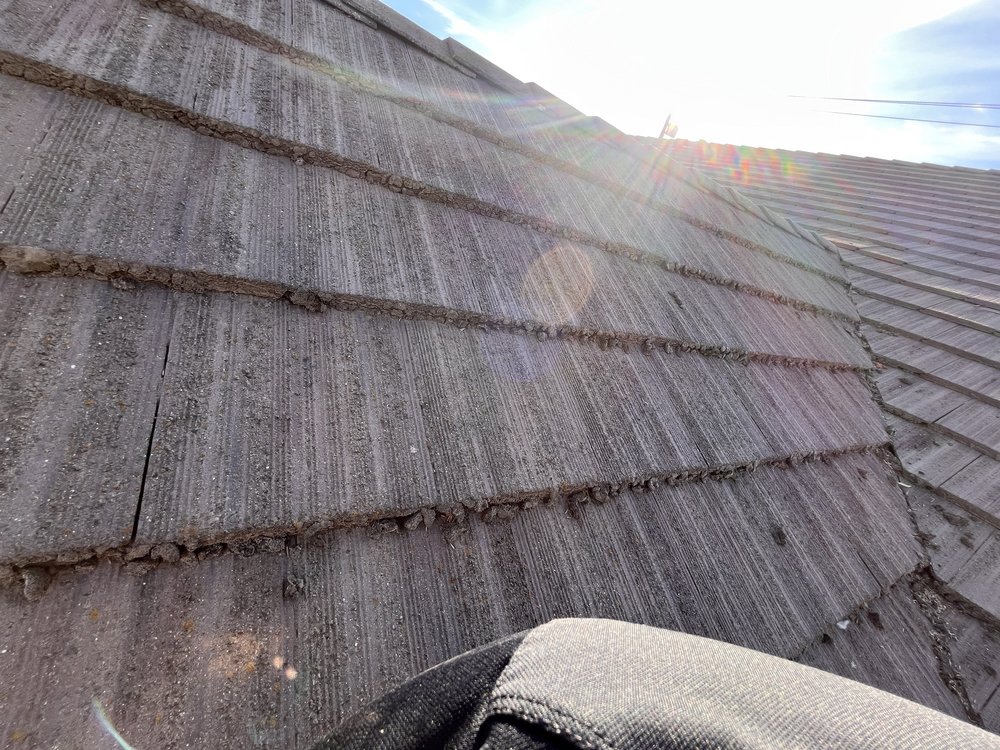 Slide of Top Notch Roof & Gutter Cleaning