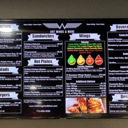 a menu on the wall a menu on the wall