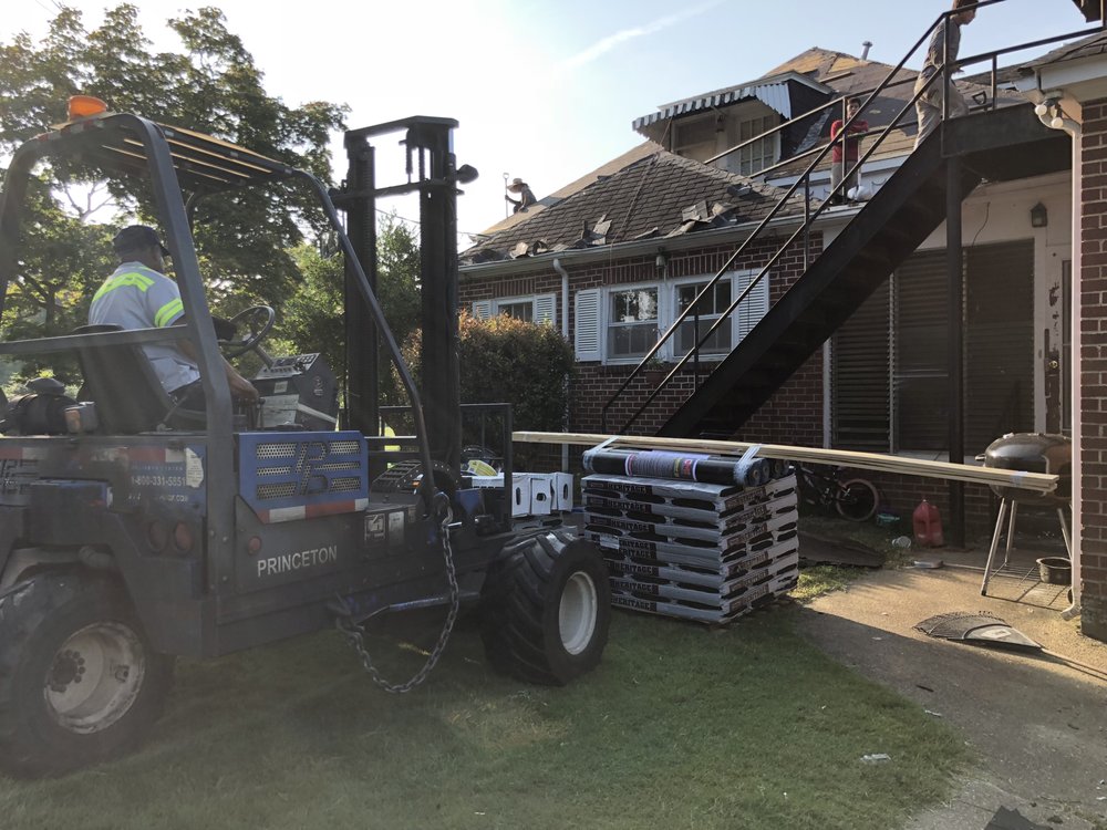 Slide of All About Roofing & Construction