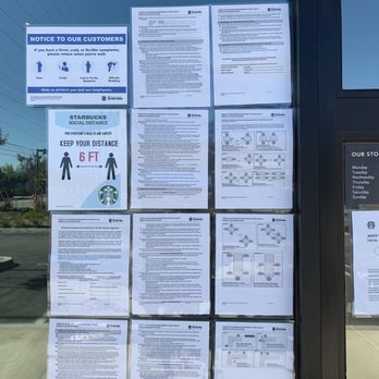 Starbucks - a bunch of signs on the door of a coffee shop - Coffee & Tea Near Me - Torrance, California