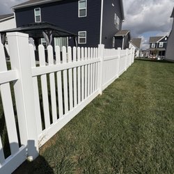 Lionguard Fencing - 4' Traditional dog ear vinyl fence with spaced picket.