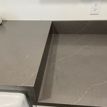 Bay Area Stone - Waterfall in laundry room with seams running through all surfaces was really tricky but turned out so nicely - General Contractors Near Me - SAN JOSE, California