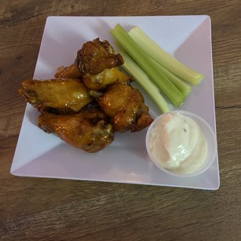 Riverside Inn - a plate of chicken wings, celery, and ranch dressing - American Near Me - Neshanic Station, New Jersey Riverside Inn - a plate of chicken wings, celery, and ranch dressing - American Near Me - Neshanic Station, New Jersey