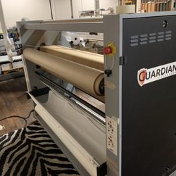 Potter's Printing - Guardian rotary calendar heat press for heat fixing sublimation inks to fabric