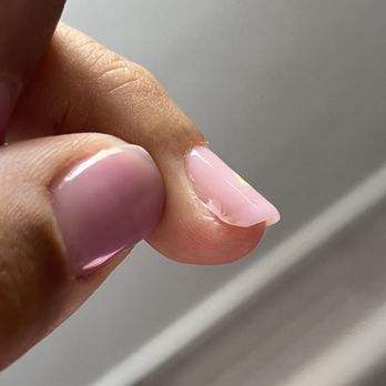 Apple Nails Lounge - Flooded cuticle made for a lack of a good seal. Already peeling here as well. - Waxing Near Me - Humble, Texas Apple Nails Lounge - Flooded cuticle made for a lack of a good seal. Already peeling here as well. - Waxing Near Me - Humble, Texas
