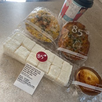 85°C Bakery Cafe-Irvine - Coconut Snow Cube, Hokkaido Cheese Tart, Elote (corn), Mushroom Wheat & Hot Sea Salt Coffee (from front L to R to back) - Coffee & Tea Near Me - Irvine, California