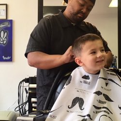 Mr Cuts - Excellent barber, w/ patience for leery kids!