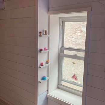 S.C. Services -  a window in a room - General Contractors Near Me