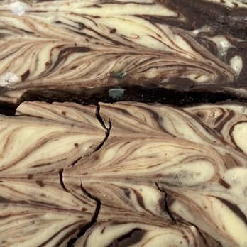 Creative Sweet Treats - a close up of a piece of cake - Bakeries Near Me