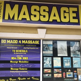 Go Madd 4 Massage - Full window display with sign above - Massage Therapy Near Me - St Augustine, Florida