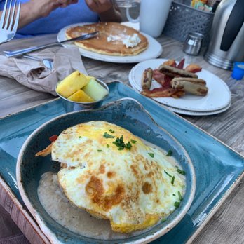 First Watch - Biscuit and gravy with fried eggs! Yum!!! - Breakfast & Brunch Near Me - Morris Plains, New Jersey
