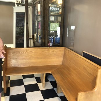 Urban Parisian - a woman standing in front of a bench - Bakeries Near Me - Port Dover, Ontario Urban Parisian - a woman standing in front of a bench - Bakeries Near Me - Port Dover, Ontario