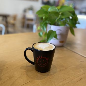 Milk & Honey - Coffee cup with plant in the background - Coffee & Tea Near Me - Aliso Viejo, California Milk & Honey - Coffee cup with plant in the background - Coffee & Tea Near Me - Aliso Viejo, California