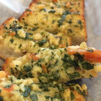 The Queensboro - Garlic Clam Bread - Portion really is snack sized. - Gastropubs Near Me - Jackson Heights, New York The Queensboro - Garlic Clam Bread - Portion really is snack sized. - Gastropubs Near Me - Jackson Heights, New York