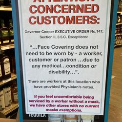 Asheville ABC - Giant "we don't need to wear masks" sign by an outdated and unnecessary government agency.