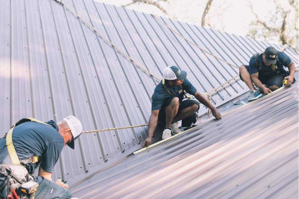Slide of Tadlock Roofing