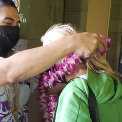 Hawaiian Lei Greetings - My mom getting her lei!