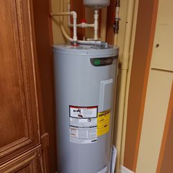 Drains Plus - New water heater with new expansion tank, new tray and all new plumbing and valves.