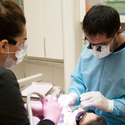 Simply Smiles - Comprehensive Dentistry And Facial Esthetics - Dr. Sabharwal and a Patient