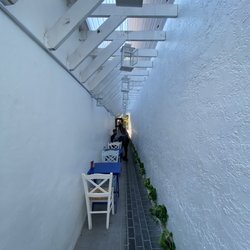 Meraki Greek Bistro - Outdoor dining alley